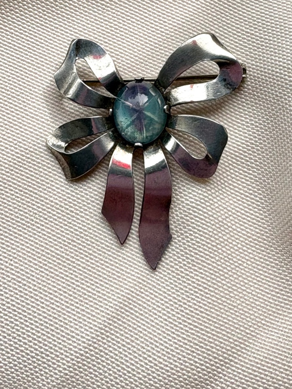 Vintage 1940s Sterling Silver Ribbon Bow Brooch Glass Blue Cabochon Pin
